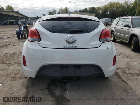 2013 Hyundai Veloster w/Gray Int с VIN KMHTC6AD0DU167414, выставлен на аукционе Copart как лот 73476894 с пробегом 119 928 миль миль и Списание • Salvage title. История ставок и продаж доступна на DreamBid. Изображение 6.