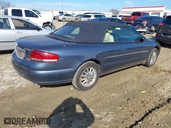 ✅ 2002 Chrysler Sebring Limited • VIN: 1C3EL65R82N166400 • Lot: 43865109. Listed on IAAI with 126,628 mi. Free auction sales archive from the USA and detailed vehicle history report at DreamBid. Image 4.