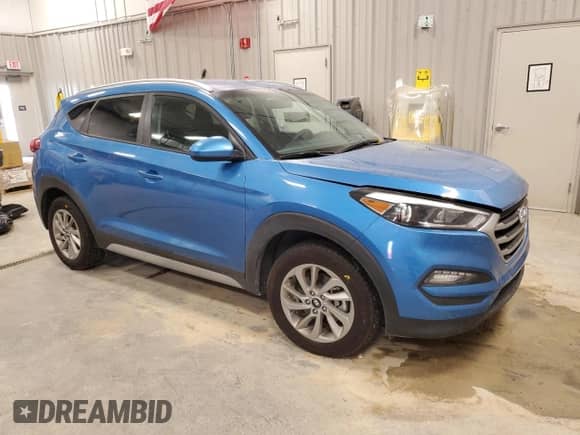 2018 Hyundai Tucson SEL with VIN KM8J3CA44JU614683, listed as a Copart auction lot 69869295 with Not provided miles and Salvage title. Bid and sale history available at DreamBid. Image 4.
