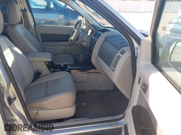 ✅ 2009 Ford Escape Hybrid • VIN: 1FMCU49369KA52087 • Lot: 43491225. Listed on IAAI with 208,540 mi. Free auction sales archive from the USA and detailed vehicle history report at DreamBid. Image 5.