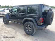 ✅ 2018 Jeep Wrangler Unlimited Rubicon • VIN: 1C4HJXFG9JW119631 • Lot: 43196637. Listed on IAAI with 119,106 mi. Free auction sales archive from the USA and detailed vehicle history report at DreamBid. Image 3.