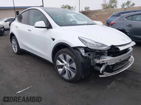 ✅ 2023 Tesla Model Y Long Range • VIN: 7SAYGDEE5PA063097 • Lot: 42171871. Listed on IAAI with Not provided. Free auction sales archive from the USA and detailed vehicle history report at DreamBid. Image 1.