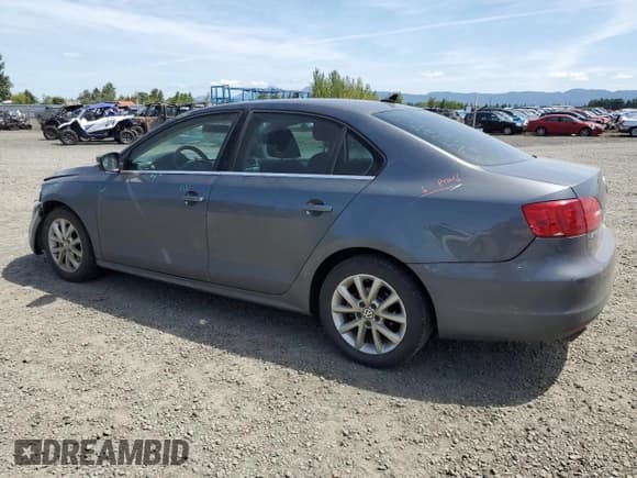 ✅ 2013 Volkswagen Jetta SE • VIN: 3VWDP7AJXDM281723 • Lot: 57235725. Listed on Copart with 128,157 mi. Free auction sales archive from the USA and detailed vehicle history report at DreamBid. Image 2.