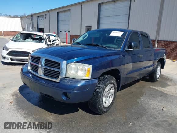 2006 Dodge Dakota SLT with VIN 1D7HE48N76S702816, listed as a IAAI auction lot 41685793 with 192,271 mi miles and . Bid and sale history available at DreamBid. Image 17.