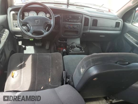 2003 Dodge 1500 ST with VIN 1D7HU18N23S135041, listed as a Copart auction lot 70694204 with 101,155 mi miles and Salvage title. Bid and sale history available at DreamBid. Image 8.