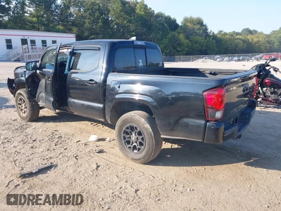 ✅ 2018 Toyota Tacoma SR • VIN: 5TFAX5GN5JX118987 • Лот: 43201622. Опубликован ранее на IAAI с пробегом 100 927 миль. Бесплатный доступ к архиву аукционных продаж из США и подробный отчёт об истории автомобиля на DreamBid. Изображение 3.
