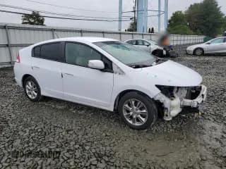 ✅ 2010 Honda Insight EX • VIN: JHMZE2H79AS035081 • Лот: 72978784. Опубликован ранее на Copart с пробегом 146 296 миль. Бесплатный доступ к архиву аукционных продаж из США и подробный отчёт об истории автомобиля на DreamBid. Изображение 4.