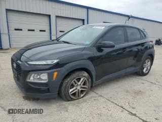 ✅ 2019 Hyundai Kona SE • VIN: KM8K12AA8KU336107 • Лот: 86301055. Опубликован ранее на Copart с пробегом 109 359 миль. Бесплатный доступ к архиву аукционных продаж из США и подробный отчёт об истории автомобиля на DreamBid. Изображение 1.