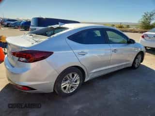 2019 Hyundai Elantra SEL z VIN 5NPD84LF2KH446870, wystawiony jako Copart lot #90880045 z przebiegiem 126 414 mil mil oraz Czysty tytuł • Clean title. Historia ofert i sprzedaży dostępna na DreamBid. Obrazek 3.