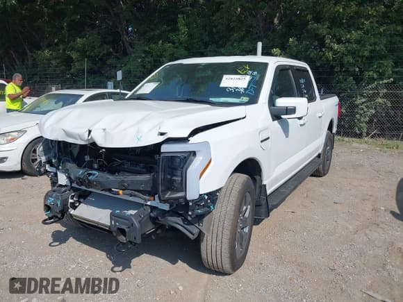 ✅ 2023 Ford F-150 Lightning Pro • VIN: 1FTVW1EL5PWG22503 • Lot: 42825825. Listed on IAAI with 7,030 mi. Free auction sales archive from the USA and detailed vehicle history report at DreamBid. Image 2.