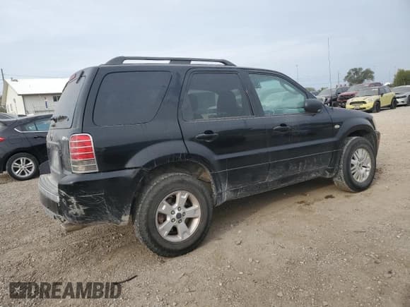 ✅ 2006 Mercury Mariner Luxury • VIN: 4M2YU57136DJ07042 • Lot: 83859705. Listed on Copart with 202,450 mi. Free auction sales archive from the USA and detailed vehicle history report at DreamBid. Image 3.