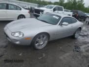 ✅ 2000 Jaguar XK • VIN: SAJJA41B6YPA01802 • Lot: 57146745. Listed on Copart with 32,208 mi. Free auction sales archive from the USA and detailed vehicle history report at DreamBid. Image 1.