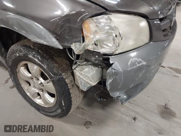 ✅ 2002 Mazda Tribute LX • VIN: 4F2CU08132KM39554 • Лот: 42015060. Опубликован ранее на IAAI с пробегом 99 128 миль. Бесплатный доступ к архиву аукционных продаж из США и подробный отчёт об истории автомобиля на DreamBid. Изображение 6.