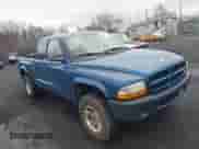 2003 Dodge Dakota Sport z VIN 1D7HG32NX3S322085, wystawiony jako IAAI lot #41780125 z przebiegiem 95 321 mil mil oraz . Historia ofert i sprzedaży dostępna na DreamBid. Obrazek 1.