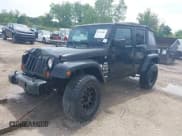 ✅ 2008 Jeep Wrangler Unlimited X • VIN: 1J4GA39138L641138 • Лот: 42376300. Опубликован ранее на IAAI с пробегом 215 026 миль. Бесплатный доступ к архиву аукционных продаж из США и подробный отчёт об истории автомобиля на DreamBid. Изображение 2.