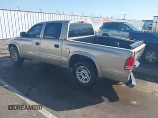 ✅ 2004 Dodge Dakota SLT • VIN: 1D7HL48N44S504617 • Lot: 41955400. Wystawiony na IAAI z przebiegiem 196 096 mil. Bezpłatny archiwum sprzedaży aukcyjnych z USA i szczegółowy raport historii pojazdu na DreamBid. Zdjęcie 3.