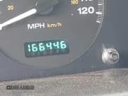 ✅ 2002 Jeep Grand Cherokee Laredo • VIN: 1J4GX48N42C245591 • Lot: 42287218. Listed on IAAI with 166,446 mi. Free auction sales archive from the USA and detailed vehicle history report at DreamBid. Image 13.