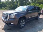 ✅ 2018 GMC Yukon XL Denali • VIN: 1GKS1HKJXJR304562 • Lot: 42978670. Listed on IAAI with 171,775 mi. Free auction sales archive from the USA and detailed vehicle history report at DreamBid. Image 2.