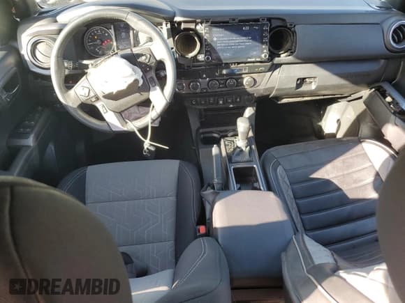 ✅ 2023 Toyota Tacoma TRD Off Road • VIN: 3TMDZ5BN6PM162364 • Lot: 82401895. Wystawiony na Copart z przebiegiem 54 505 mil. Bezpłatny archiwum sprzedaży aukcyjnych z USA i szczegółowy raport historii pojazdu na DreamBid. Zdjęcie 8.