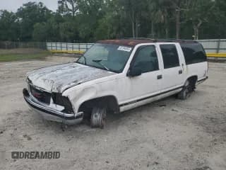 ✅ 1997 GMC Suburban • VIN: 1GKEC16R9VJ728883 • Лот: 52104265. Опубликован ранее на Copart с пробегом 246 816 миль. Бесплатный доступ к архиву аукционных продаж из США и подробный отчёт об истории автомобиля на DreamBid. Изображение 1.