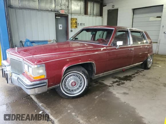 ✅ 1987 Cadillac Brougham • VIN: 1G6DW51Y8H9760303 • Lot: 59555665. Wystawiony na Copart z przebiegiem 34 784 mil. Bezpłatny archiwum sprzedaży aukcyjnych z USA i szczegółowy raport historii pojazdu na DreamBid. Zdjęcie 1.