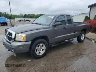2006 Dodge Dakota SLT с VIN 1D7HW42N26S501704, выставлен на аукционе Copart как лот 57629665 с пробегом 116 183 миль миль и Списание • Salvage title. История ставок и продаж доступна на DreamBid. Изображение 1.