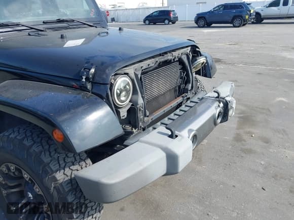 ✅ 2015 Jeep Wrangler Sport • VIN: 1C4AJWAG1FL594007 • Lot: 43779956. Listed on IAAI with 170,911 mi. Free auction sales archive from the USA and detailed vehicle history report at DreamBid. Image 19.