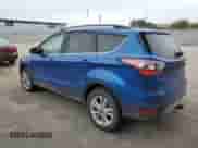2018 Ford Escape SE z VIN 1FMCU9GD7JUA05961, wystawiony jako Copart lot #82458805 z przebiegiem Nie podano mil oraz Czysty tytuł • Clean title. Historia ofert i sprzedaży dostępna na DreamBid. Obrazek 2.