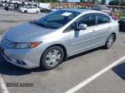 ✅ 2012 Honda Civic • VIN: JHMFB4F30CS007969 • Lot: 43179573. Listed on IAAI with 126,937 mi. Free auction sales archive from the USA and detailed vehicle history report at DreamBid. Image 2.