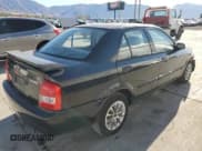 ✅ 2000 Mazda Protege DX • VIN: JM1BJ2220Y0239835 • Lot: 80228864. Wystawiony na Copart z przebiegiem 200 936 mil. Bezpłatny archiwum sprzedaży aukcyjnych z USA i szczegółowy raport historii pojazdu na DreamBid. Zdjęcie 3.