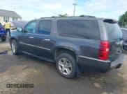 ✅ 2011 Chevrolet Suburban LTZ • VIN: 1GNSKKE38BR169495 • Lot: 43372468. Listed on IAAI with 119,937 mi. Free auction sales archive from the USA and detailed vehicle history report at DreamBid. Image 3.