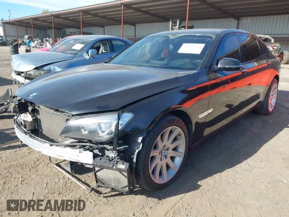 ✅ 2014 BMW 7 Series 740Li • VIN: WBAYE4C52ED138168 • Lot: 43483619. Listed on IAAI with 109,048 mi. Free auction sales archive from the USA and detailed vehicle history report at DreamBid. Image 2.