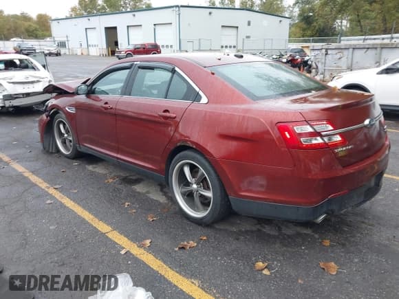 ✅ 2014 Ford Taurus SEL • VIN: 1FAHP2H8XEG138900 • Lot: 43458227. Listed on IAAI with 109,233 mi. Free auction sales archive from the USA and detailed vehicle history report at DreamBid. Image 3.