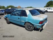 ✅ 1992 Plymouth Sundance • VIN: 1P3XP24D7NN120553 • Lot: 68472794. Listed on Copart with 148,535 mi. Free auction sales archive from the USA and detailed vehicle history report at DreamBid. Image 2.