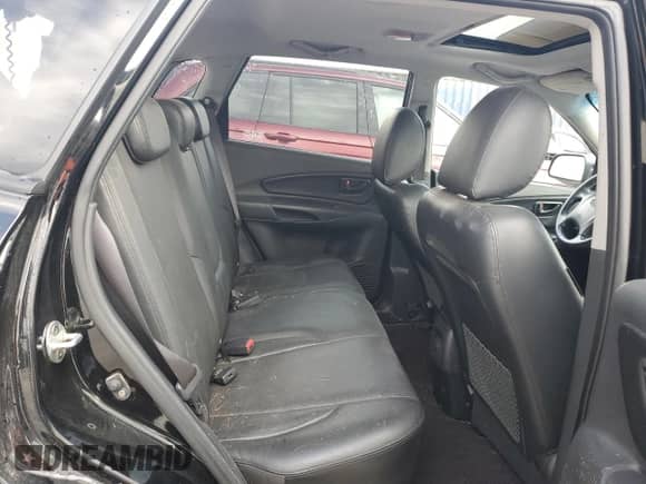 2009 Hyundai Tucson SE z VIN KM8JN72D69U974579, wystawiony jako Copart lot #76964564 z przebiegiem 98 569 mil mil oraz Nie do naprawy • Non repairable. Historia ofert i sprzedaży dostępna na DreamBid. Obrazek 10.