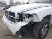 ✅ 2007 Dodge Dakota SLT • VIN: 1D7HE48K67S118009 • Лот: 43588988. Опубликован ранее на IAAI с пробегом 160 478 миль. Бесплатный доступ к архиву аукционных продаж из США и подробный отчёт об истории автомобиля на DreamBid. Изображение 6.