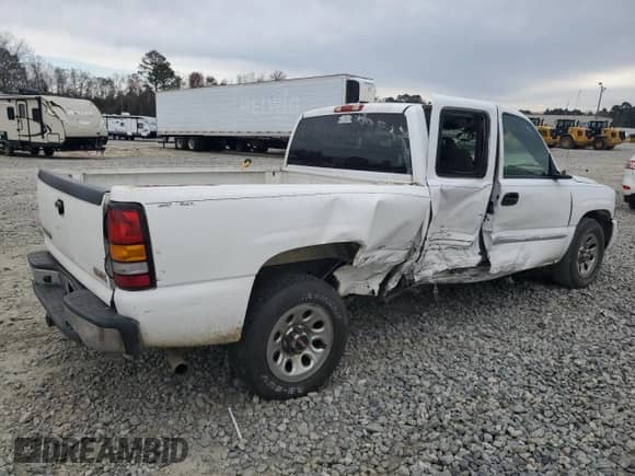 2007 GMC Sierra 1500 SLE1 with VIN 1GTEC19V57Z169728, listed as a Copart auction lot 46986145 with 291,456 mi miles and Salvage title. Bid and sale history available at DreamBid. Image 3.