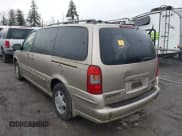 ✅ 1998 Oldsmobile Silhouette GL • VIN: 1GHDX03E8WD199007 • Lot: 41642100. Wystawiony na IAAI z przebiegiem 184 722 mil. Bezpłatny archiwum sprzedaży aukcyjnych z USA i szczegółowy raport historii pojazdu na DreamBid. Zdjęcie 3.