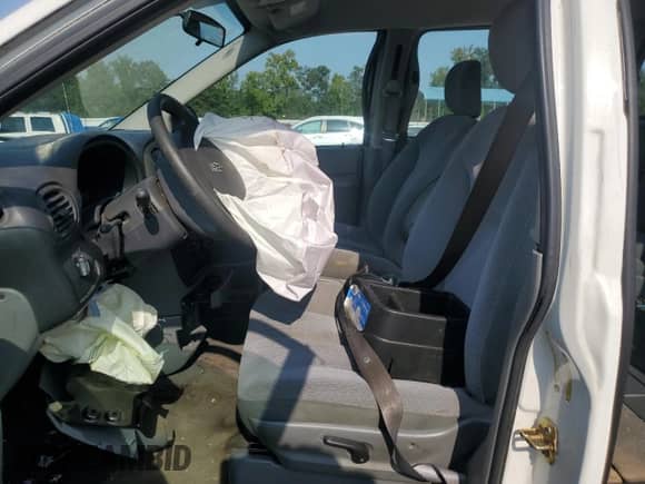 2006 Dodge Grand Caravan SE with VIN 1D4GP24R36B659785, listed as a Copart auction lot 70470085 with 138,017 mi miles and Salvage title. Bid and sale history available at DreamBid. Image 7.