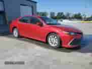 2023 Toyota Camry LE z VIN 4T1C11AK5PU115918, wystawiony jako Copart lot #85148995 z przebiegiem 57 491 mil mil oraz Czysty tytuł • Clean title. Historia ofert i sprzedaży dostępna na DreamBid. Obrazek 4.