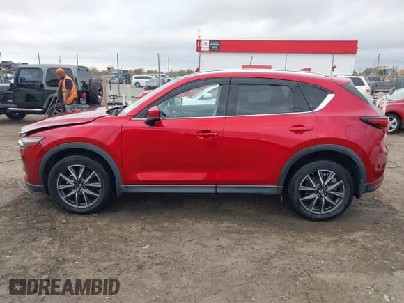 ✅ 2018 Mazda CX-5 Grand Touring • VIN: JM3KFADM4J0432206 • Lot: 43723615. Listed on IAAI with 81,130 mi. Free auction sales archive from the USA and detailed vehicle history report at DreamBid. Image 14.