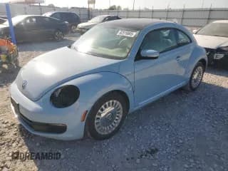 ✅ 2015 Volkswagen Beetle 1.8T • VIN: 3VWJ07AT0FM634806 • Lot: 82519985. Listed on Copart with 79,482 mi. Free auction sales archive from the USA and detailed vehicle history report at DreamBid. Image 1.