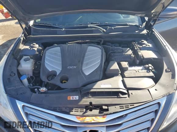 2012 Hyundai Azera с VIN KMHFG4JG4CA183714, выставлен на аукционе Copart как лот 48226105 с пробегом 120 700 миль миль и Списание • Salvage title. История ставок и продаж доступна на DreamBid. Изображение 11.