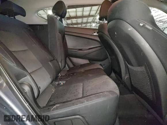 2017 Hyundai Tucson SE z VIN KM8J23A4XHU393961, wystawiony jako Copart lot #85645105 z przebiegiem 86 519 mil mil oraz Szkoda całkowita • Salvage title. Historia ofert i sprzedaży dostępna na DreamBid. Obrazek 11.