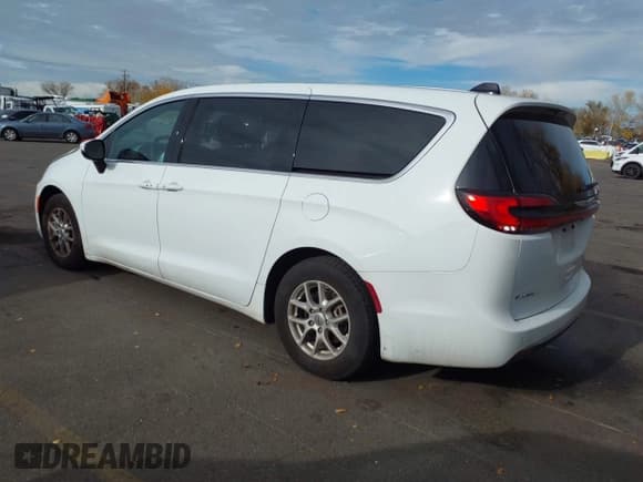 ✅ 2023 Chrysler Pacifica Touring • VIN: 2C4RC1FG5PR610811 • Lot: 43733563. Listed on IAAI with 55,492 mi. Free auction sales archive from the USA and detailed vehicle history report at DreamBid. Image 3.