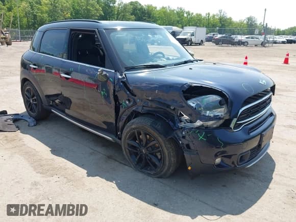 ✅ 2015 MINI Countryman S • VIN: WMWZC5C50FWP46017 • Lot: 42418553. Listed on IAAI with 75,457 mi. Free auction sales archive from the USA and detailed vehicle history report at DreamBid. Image 1.