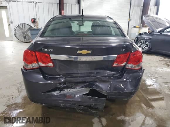 2014 Chevrolet Cruze 1LT z VIN 1G1PC5SB6E7436408, wystawiony jako Copart lot #89872335 z przebiegiem 79 660 mil mil oraz Szkoda całkowita • Salvage title. Historia ofert i sprzedaży dostępna na DreamBid. Obrazek 6.