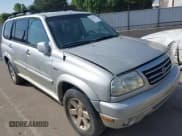 ✅ 2001 Suzuki XL7 Standard • VIN: JS3TX92V514103609 • Lot: 42146285. Listed on IAAI with 218,524 mi. Free auction sales archive from the USA and detailed vehicle history report at DreamBid. Image 1.