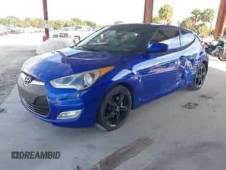 2012 Hyundai Veloster w/Gray Int z VIN KMHTC6AD2CU065076, wystawiony jako IAAI lot #43421355 z przebiegiem 152 752 mil mil oraz . Historia ofert i sprzedaży dostępna na DreamBid. Obrazek 2.