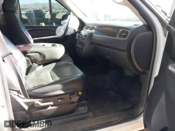 2011 Chevrolet Tahoe Commercial with VIN 1GNSK2E09BR200100, listed as a IAAI auction lot 41721798 with 143,557 mi miles and . Bid and sale history available at DreamBid. Image 5.